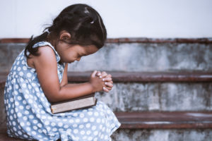 child in prayer